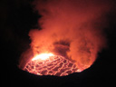 Lac de lave au Niryagongo. Le volcan Niryagongo est situé sur le rift de l'afrique de l'est. Son lac permanent de lave était de 200m de diamètre en 2007. En 2009 le niveau du lac est 150m plus haut. [6881 views]