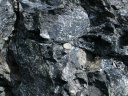 Serpentinite. Péridotite altérée (hydrothermalisme, faible métamorphisme) présentant des minéraux du groupe des serpentines (antigorite, chrysotile). [29125 views]