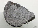 Nova 003, achondrite trouvée en 1991 en Australie. Les achondrites représentent 8% des météorites. Elles proviennent de la croûte et du manteau des astéroïdes différenciés. On les nomme ainsi car elles ne contiennent pas de chondres, ces derniers ayant fondu lors du processus de différenciation de leur corps-parent. Certaines sont des roches volcaniques issues de volcans astéroïdaux. Pauvres en métal, elles sont souvent difficiles à distinguer des roches terrestres.

 [22315 views]